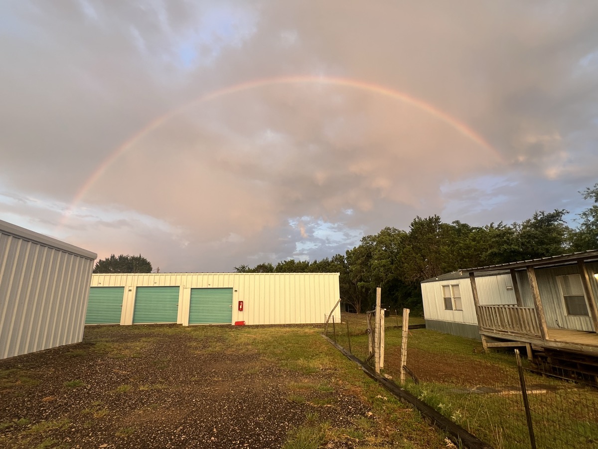 Rainbow over Antler Mini Storage Pipe Creek location with office building